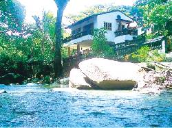 FINCA BRISAL La Casa en el Ro Santa Marta, Colombia