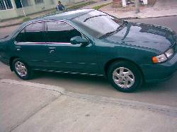 VENDO NISSAN B14 1998 GXE HERMOSO VERDE BOGOTA, COLOMBIA